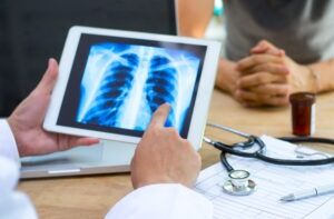 A workplace injury lawyer reviews the medical records of an injured worker.