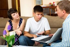 An attorney speaks with his clients and informs them about what happens after a fatal car accident.