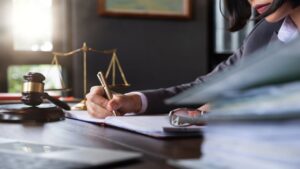 Judge Gavel with Justice Lawyers, Lawyer Working on a Documents