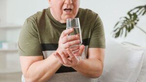 man suffering Parkinson’s disease because of Paraquat