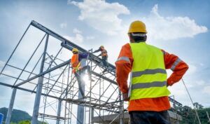 Construction workers on a building. You can discuss your legal situation with a Greenville construction accident lawyer.