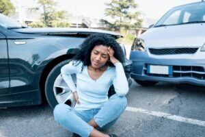 A woman is severely injured in a car accident, and she is worried about what happens if her medical bills exceed policy limits.