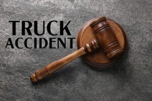 Truck,Accident,Law.,Judge's,Gavel,On,Grey,Table,,Top,View