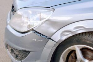 The bumper of a car after a low impact car accident