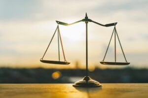 Scales of justice that symbolize the question of how you prove negligence in a slip and fall.
